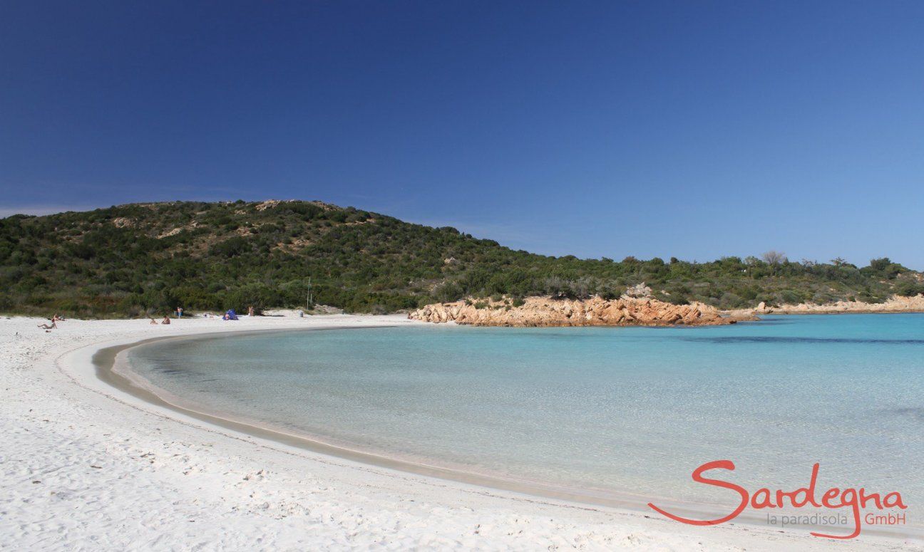 Crystal clear sea and white sandy beach of the bay Cala del principe